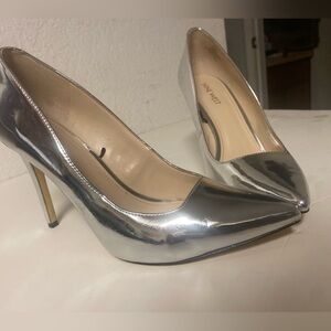 Metallic mirror nine was size 9.5 used